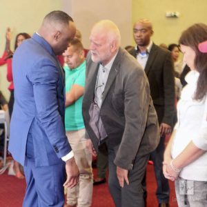 A man receives his healing during the program. LoverWorld News