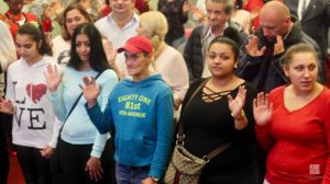 Attendees step forward to give their hearts to Christ. LoveWorld News