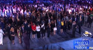 Pastor Rebecca Osorno at a healing service with Pastor Chris