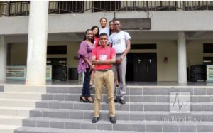 FALF representatives standing outside the Covenant International Model United Nations Conference